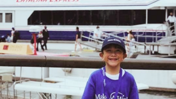 Leo in front of catalina boat
