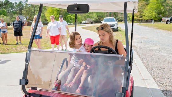 Reese taking Izzy and a friend for a spin
