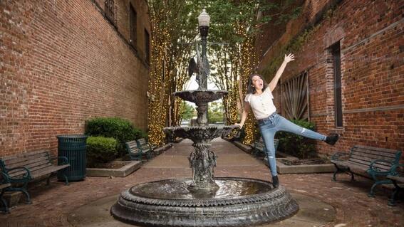 Nicole today posing on a fountain