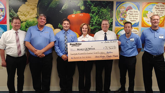 StoneRidge Piggly Wiggly presents check to Make-A-Wish Wisconsin