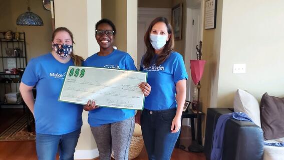Johnna with her scholarship check