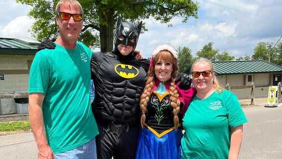 Costumed characters with Wheels, Wings and Wishes event organizers