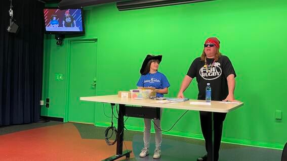 Izzy in star studio with "the dude"