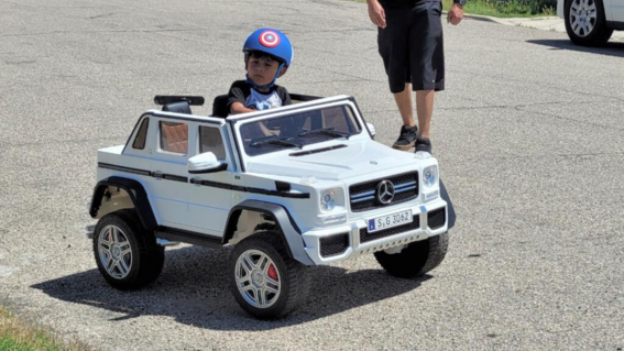 Nathan Driving His Power Wheels Car