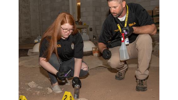 Margaret investigating crime scene.