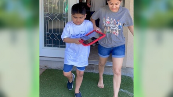 EJ running outside to see his wish come true