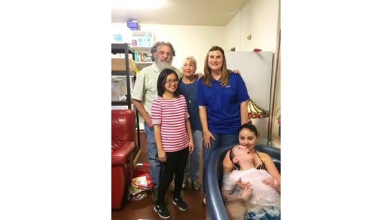 Erin, Vincis with wish family and wish kid Skyler in tub