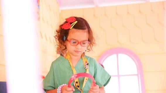 Dr. Penny in her scrubs