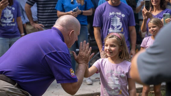 Kalli and Hogan high five