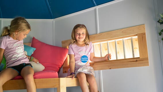 Kalli in her treehouse