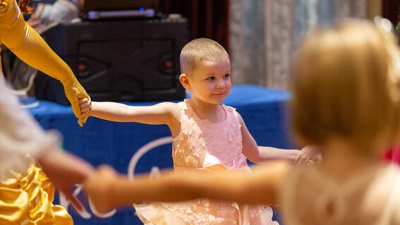 Emery dancing with princesses