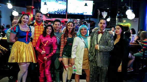 Group photo of various people in costume