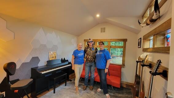 Billy Inside shed with volunteers