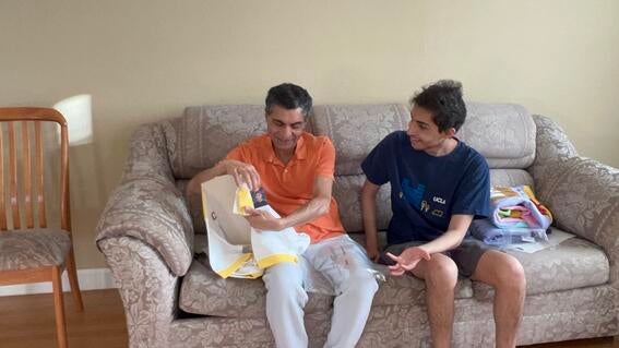 Vivek and father with samples
