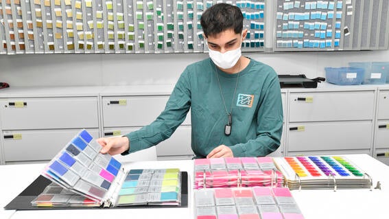 Vivek at the color room at Macy's factory in New York