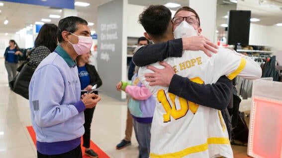 Vivek hugging his doctor at the wish celebration
