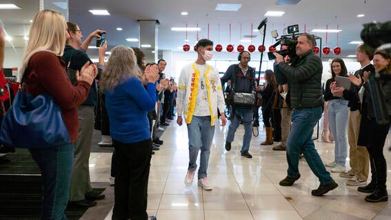 Vivek walking into Macy's