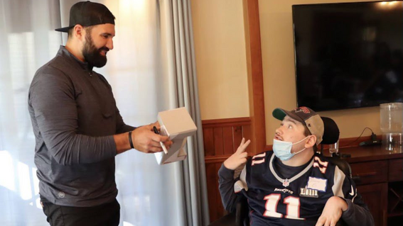 Wish Community child with Patriots alum