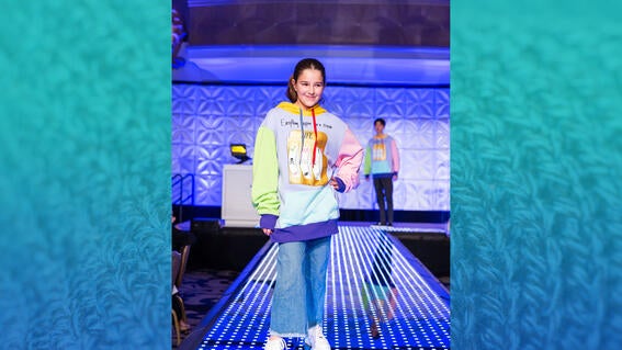 Wish alum Eva walk the runway at gala