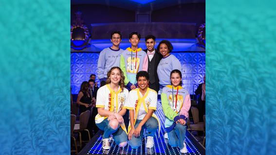 Wish alum models with wish kid and designer Vivek on the runway at gala