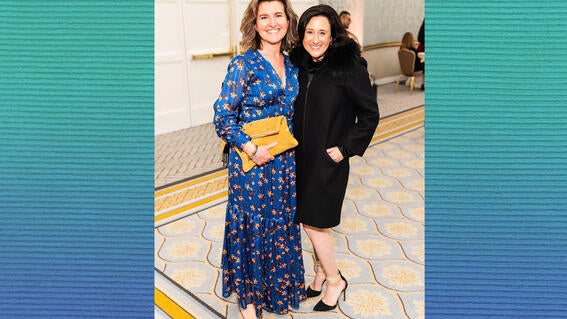 Tiffany Rowe in a long blue dress and Betina Baumgarten in black