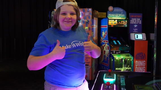 wish kid at Dave & Buster's