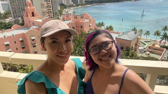 Abby with mom on balcony