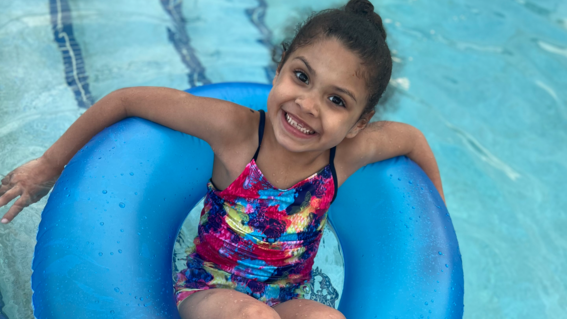 Avery enjoys tubing in the lazy river
