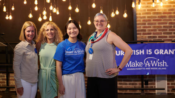 Amelia with her publisher and members of the Make-A-Wish staff at her book launch party