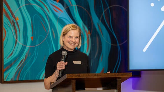 Anne announcing award