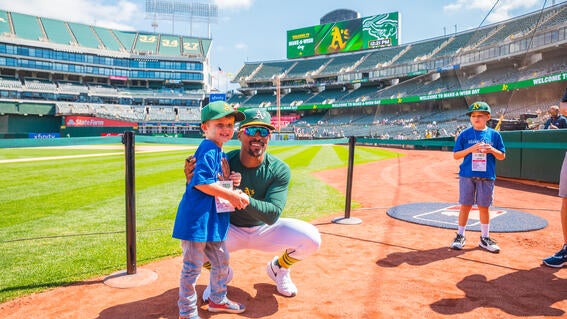 wish kid Blaize and Athletics' left fielder, Tony Kemp.