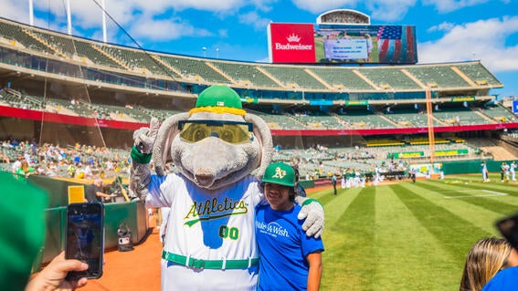 wish kid Stevie and Athletics mascot
