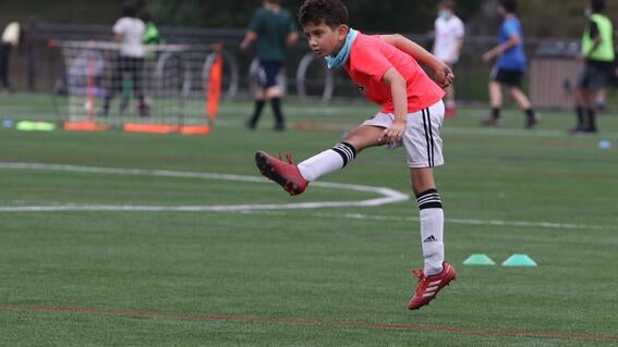 Santiago playing soccer
