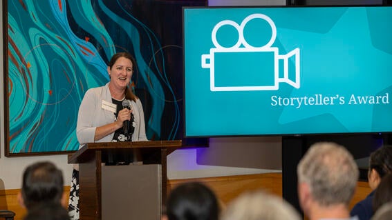 Linda announcing award at Wish Insiders Summit