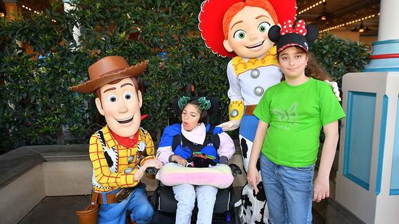 Katya and sister Alisa meeting the Toy Story characters