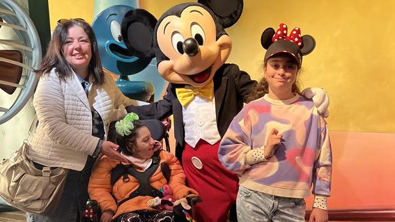 Irina, Katya, and Alisa with Mickey Mouse