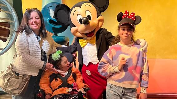 Irina, Katya, and Alisa with Mickey Mouse