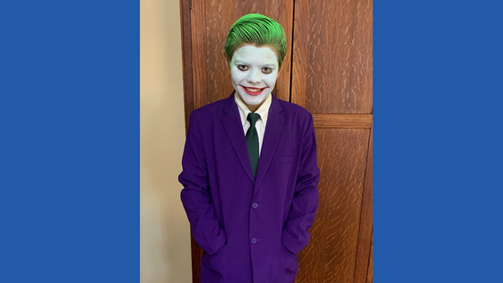 Miles dressed up as the Joker from The Dark Night for Halloween.