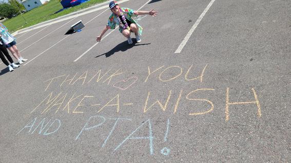 kid with sidewalk chalk