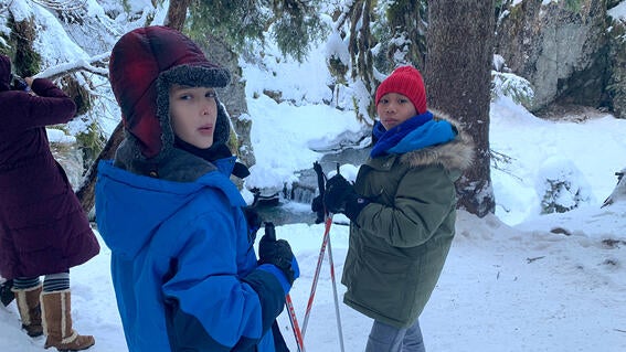 Yuval and friend skiing