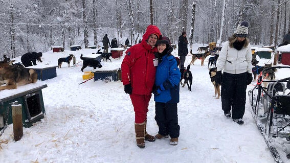 Yuval and mom dog sledding