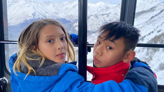 Yuval and friend on ski lift