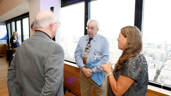 Bob Montgomery with CEO Betsy Biern and former volunteer Dan Karthas at Make-A-Wish Greater Bay Area's Wish Insiders Summit in September 2023.