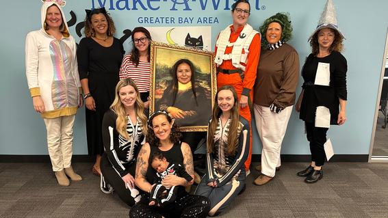 Lynne with Make-A-Wish staff on Halloween of 2023