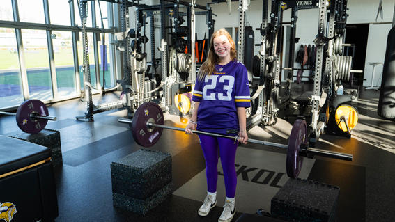 Sylvia in the Minnesota Viking's weight room.