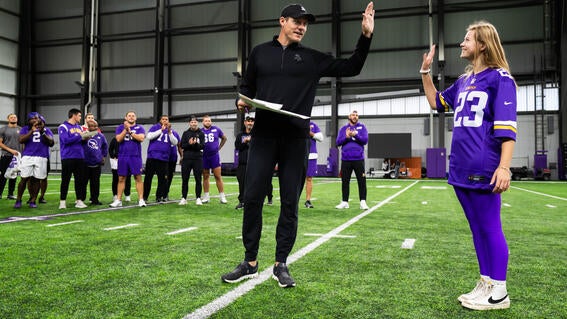 Coach O'Connell high fives Sylvia