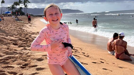 Aulani enjoying the beach in Hawaii