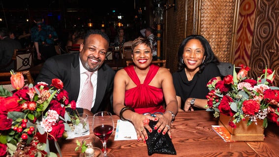 Tony Wicks, Board Member Beryl Potter, and Carla Wicks celebrate in the Tonga Room after a successful 2024 Evening of Wishes  gala.