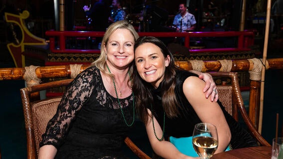 Kim Arthworth and Erica Quitzar enjoy the Tonga Room afterparty at the 2024 Evening of Wishes.