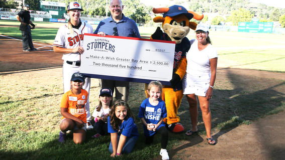 Sonoma Stompers providing Make-A-Wish with a check donation